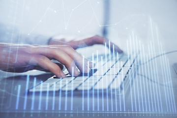 Forex graph with businessman working on computer in office on background. Concept of hardworking. Closeup. Multi exposure.