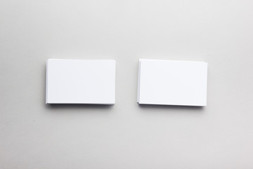 Business card blank on wooden background. Corporate Stationery, Branding Mock-up. Creative designer desk. Flat lay. Copy space for text