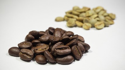 Green and Black coffee beans roasted and raw