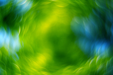 Artistic basemap background material with radial and rotating bokeh effect, beautiful and unique background that is conducive to the use of central visual focus