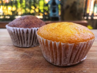 muffins on wooden table