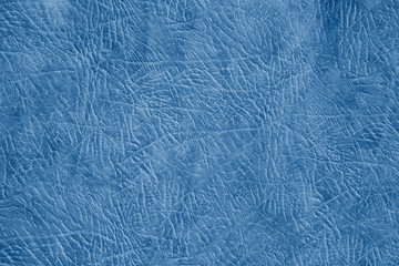 Fototapeta na wymiar close up view of a leather toned in trendy Classic Blue color of the Year 2020 background