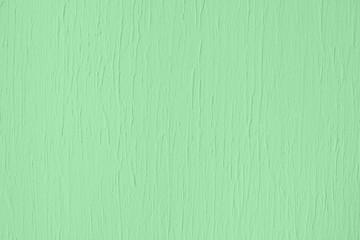 Trendy mint colored low contrast Concrete textured background with roughness and irregularities to your design or product. Year color trend concept.