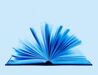 open book toned in trendy Classic Blue color of the Year 2020