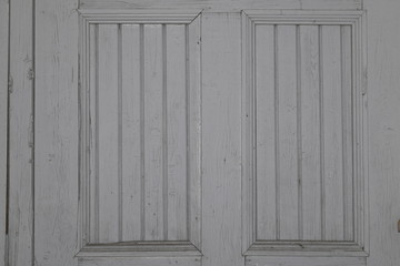 Obraz na płótnie Canvas Gray wood texture similar to a door or table made of narrow slats