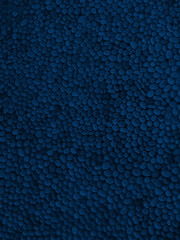 Blue coloured pebbles, stones, gravel texture background.