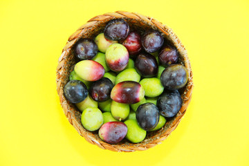 natural fresh black and burgundy olives in a decorative plate