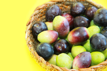 natural fresh black and burgundy olives in a decorative plate