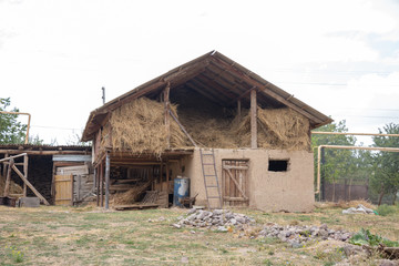 old winter barn for livestock street view
