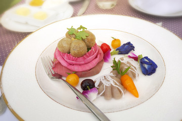 Tapioca pork, deletable imitation fruits, banana streamed pastry , Thai Traditional Dessert decorated with lotus flower and Butterfly pea