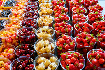 Fresh fruits at display on farmers market stall