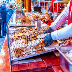 Selective focus on tasty products on a patisserie stall at the 2019 Christmas market in Maastricht,...