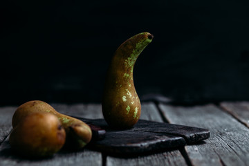 Conference pears on an old wooden table