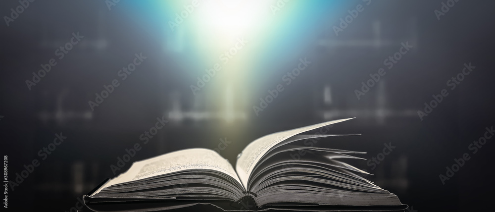 Poster imagine a picture book of an ancient book opened on a wooden table with a sparkling golden backgroun