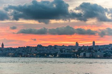 Beautiful view of Bosphorus strait with lots of building under golden sunset, View from Uskudar, Istanbul, Turkey, on the Anatolian shore of the Bosphorus.