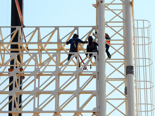 Fototapeta premium Man Working on the Working at height in construction site