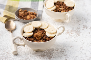 Granola, oatmeal with banana food background