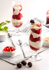 Exposition of fresh organic and nature smoothie. Tasty and healthy desert on white background.
