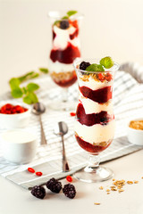 Exposition of fresh organic and nature smoothie. Tasty and healthy desert on white background.
