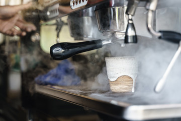 Hot water steaming from coffee blending machine