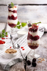 Exposition of fresh organic and nature smoothie. Tasty and healthy desert on white background.
