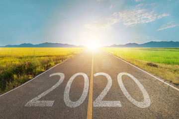 2020 write on road with sun light at the end of way metaphor New planning on next year, Goals to...