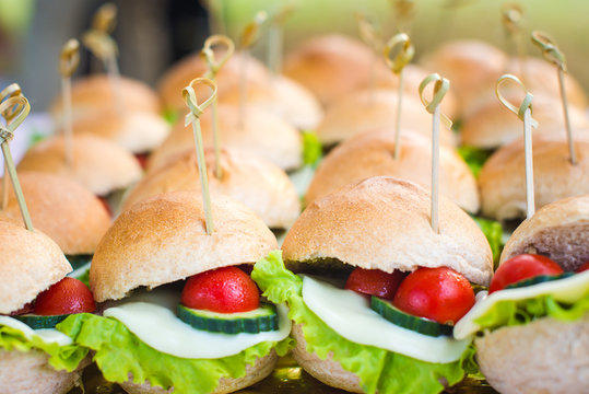 Catering For Party. Mini Sandwiches With Lettuce, Cherry Tomatoes And Mozzarella.