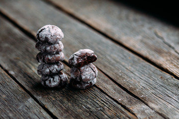 Chocolate Crinkle Cookies on an old wooden table