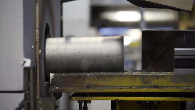 Aluminium extrusion production line factory. Production of Complex lightweight extruded aluminium metal profiles, commonly used as material in construction and manufacturing