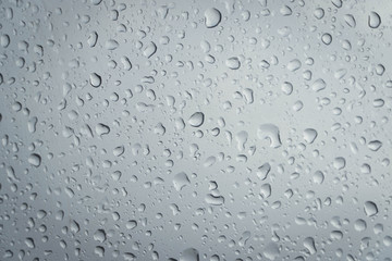 rain drop on glass texture. rainy season background