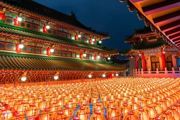 Fotobehang Chinese new year, Traditional Chinese lanterns display in Temple illuminated for Chinese new year festival. © tawatchai1990