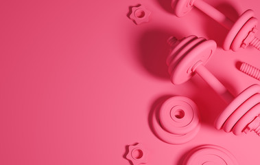 Pink set of heavy black professional dumbbells for fitness and bodybuilding on the table. Top view with copy space on the left side of the frame.