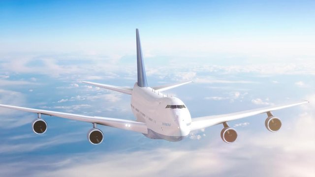 Airplane flying above clouds and beautiful blue sky in sunlight, travel trip with airplane, aerial view of flying aeroplane background.