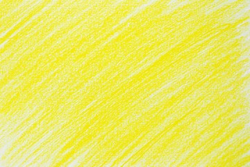 Yellow stroke crayon drawing sketch on white paper background.