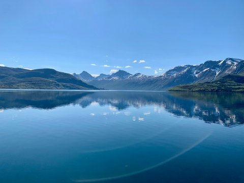 Reflections of mountains in the fjord, ⁨Halsa⁩, ⁨Nordland⁩, ⁨Norway⁩ © Timothe