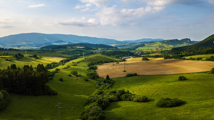 Fototapeta na wymiar Aerial view of a green field in the Tatra Mountains in summer