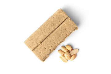 Halva and peanut isolated on white background.