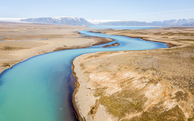 Rzeka na Islandii z drona, błękitna rzeka - obrazy, fototapety, plakaty