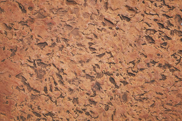 Red and Orange antique Stone Texture with dent and scratches. Stone Texture of medieval fortress wall