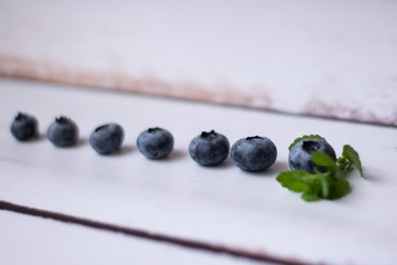 Fresh blueberries on a white background.