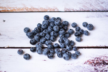 Fresh blueberries on a white background.