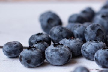 Fresh blueberries on a white background.