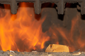 The fire burns in the stove winter home heating concept