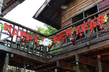 The word "Happy New Year" decorated on the terrace of the ancient house