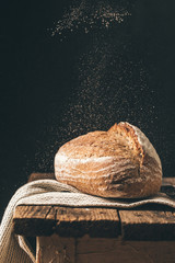 Fresh homemade crisp bread on wooden background. French bread. Bread at leaven. Unleavened bread