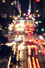 Fototapeta na wymiar Abstract defocused image of Big city night traffic