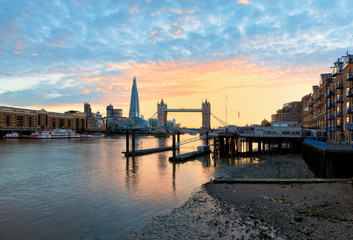 tower bridge at sunset in london with dramatic sky