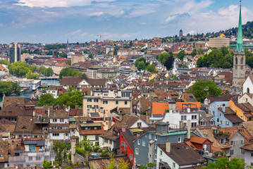 Fototapeta na wymiar Aerial view of city rooftops and towers. Zurich. Switzerland.