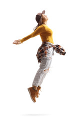Female street dancer in a jumping pose
