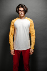 Man model with beard wearing white and yellow blank Long Sleeve Shirt for mock up a